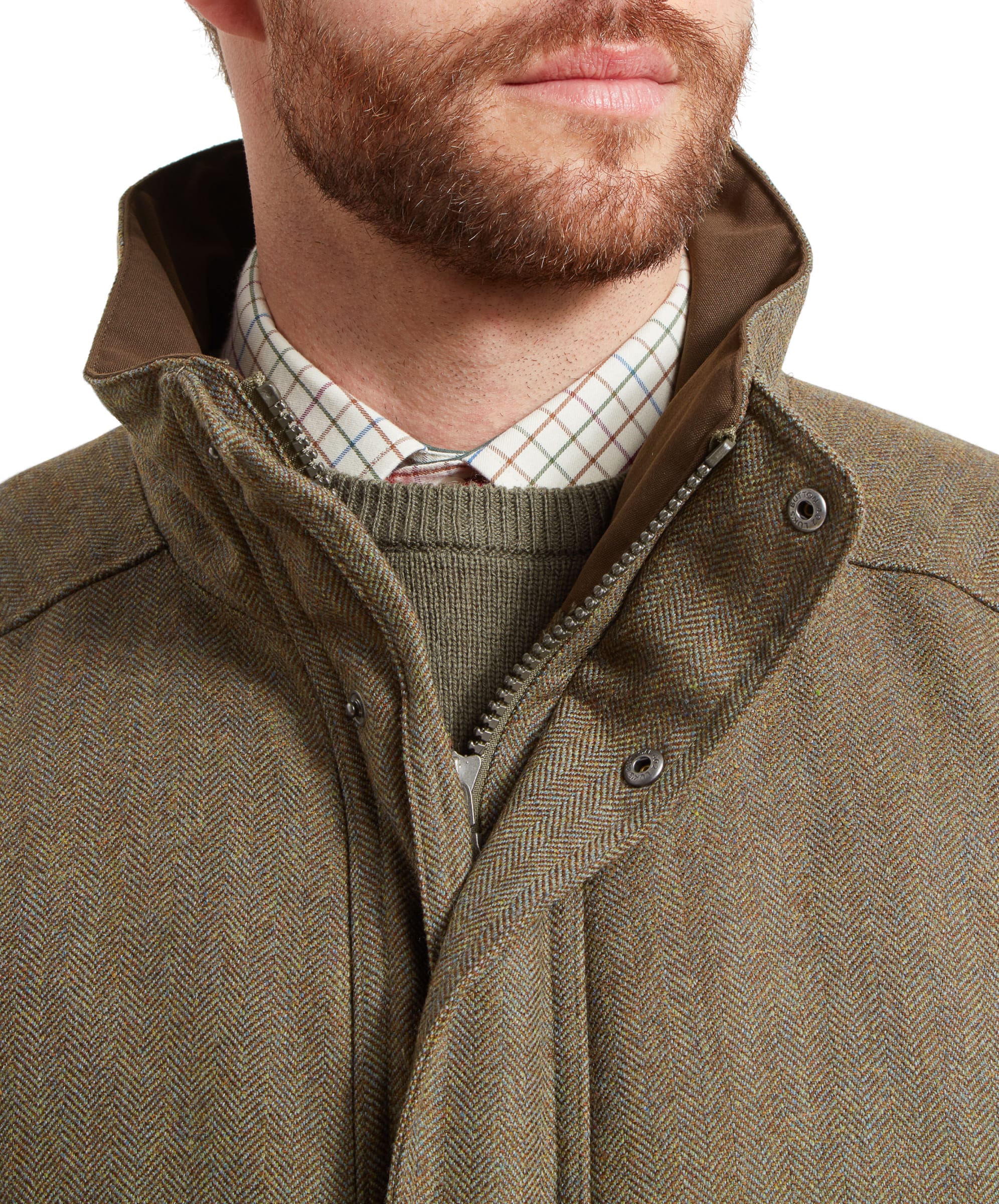 Close-up of the collar and zipper detail on the Schöffel Ptarmigan Tweed Classic Coat for Men in Green.