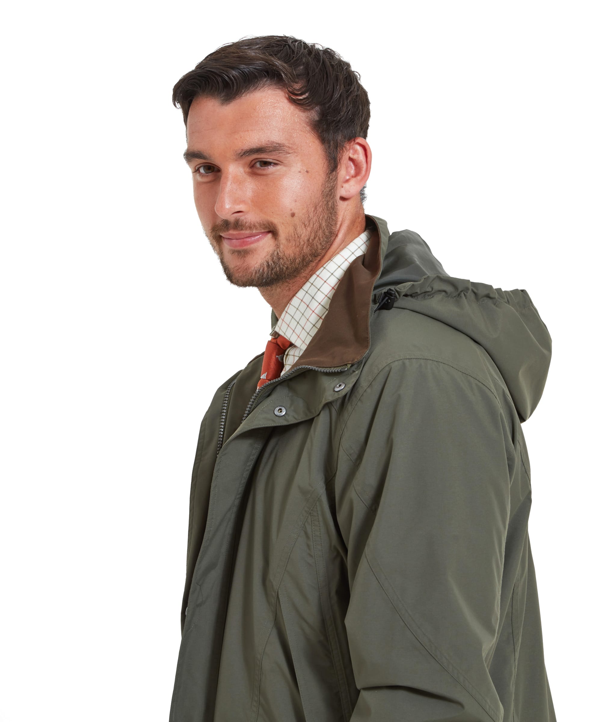 Close-up side profile of a man in the Schöffel Ptarmigan Ultralight II for Men in Green, showing the coat's hood and collar area.