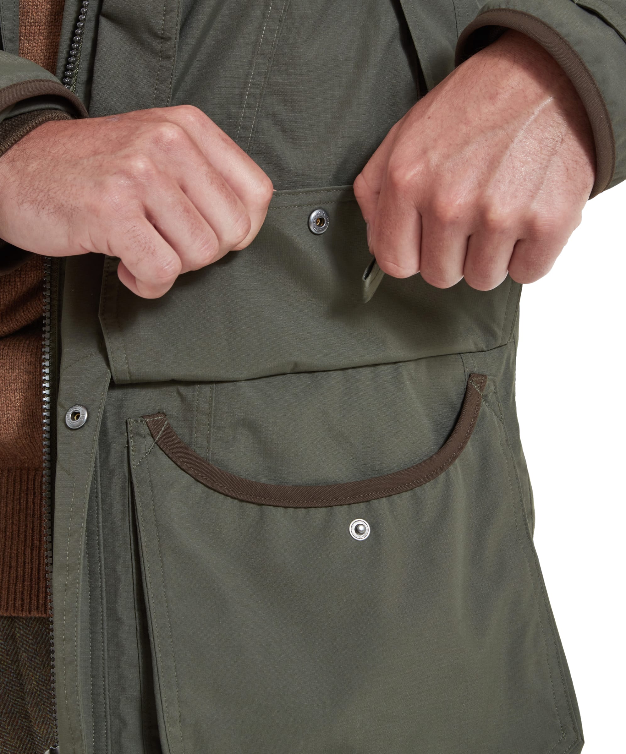 Close-up of the retainer strap and front billow pocket on the Schöffel Ptarmigan Ultralight II for Men in Green