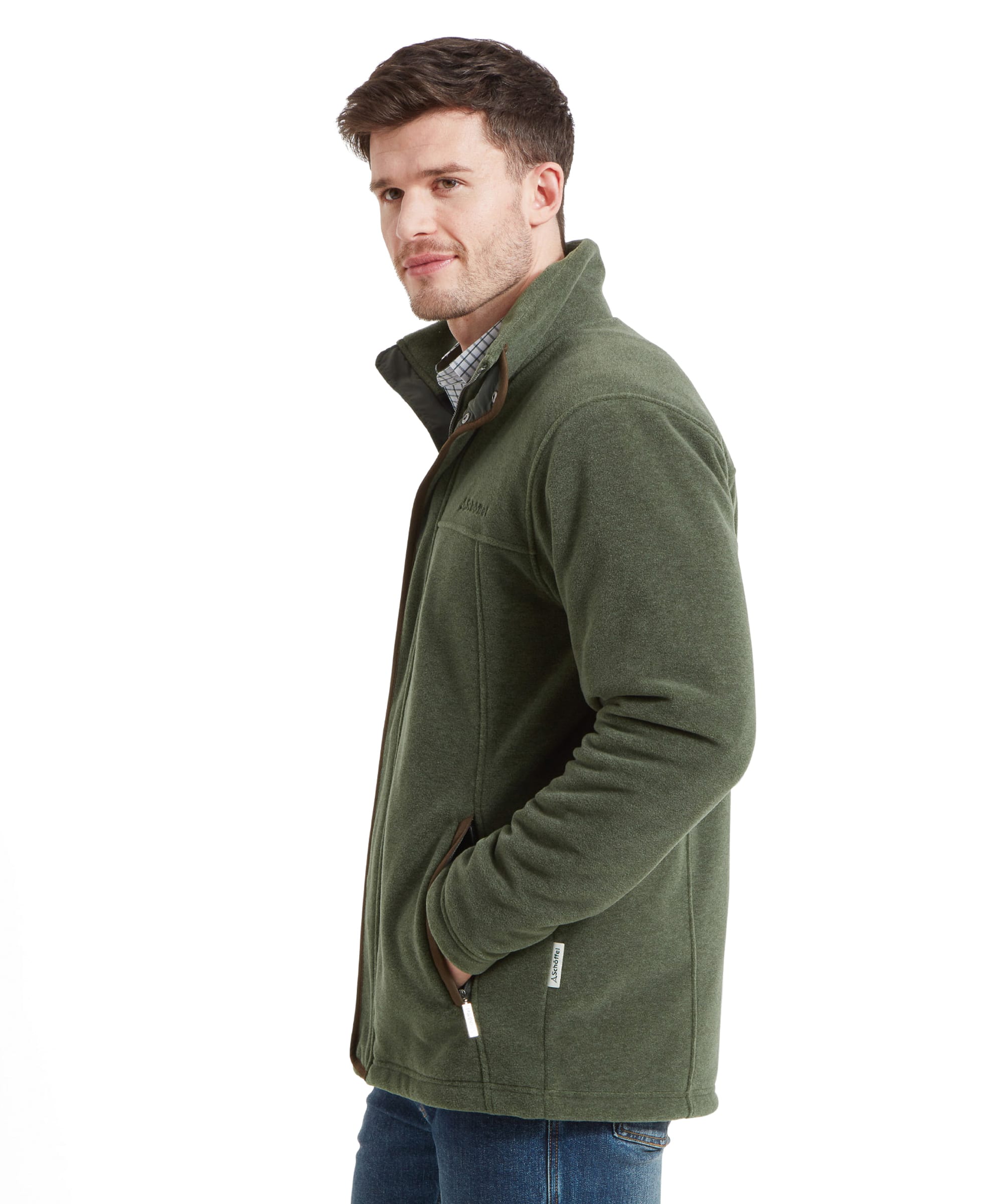 Side profile of a man wearing the Schöffel Rutland Fleece for Men in Green, showing the jacket's fit and pockets.