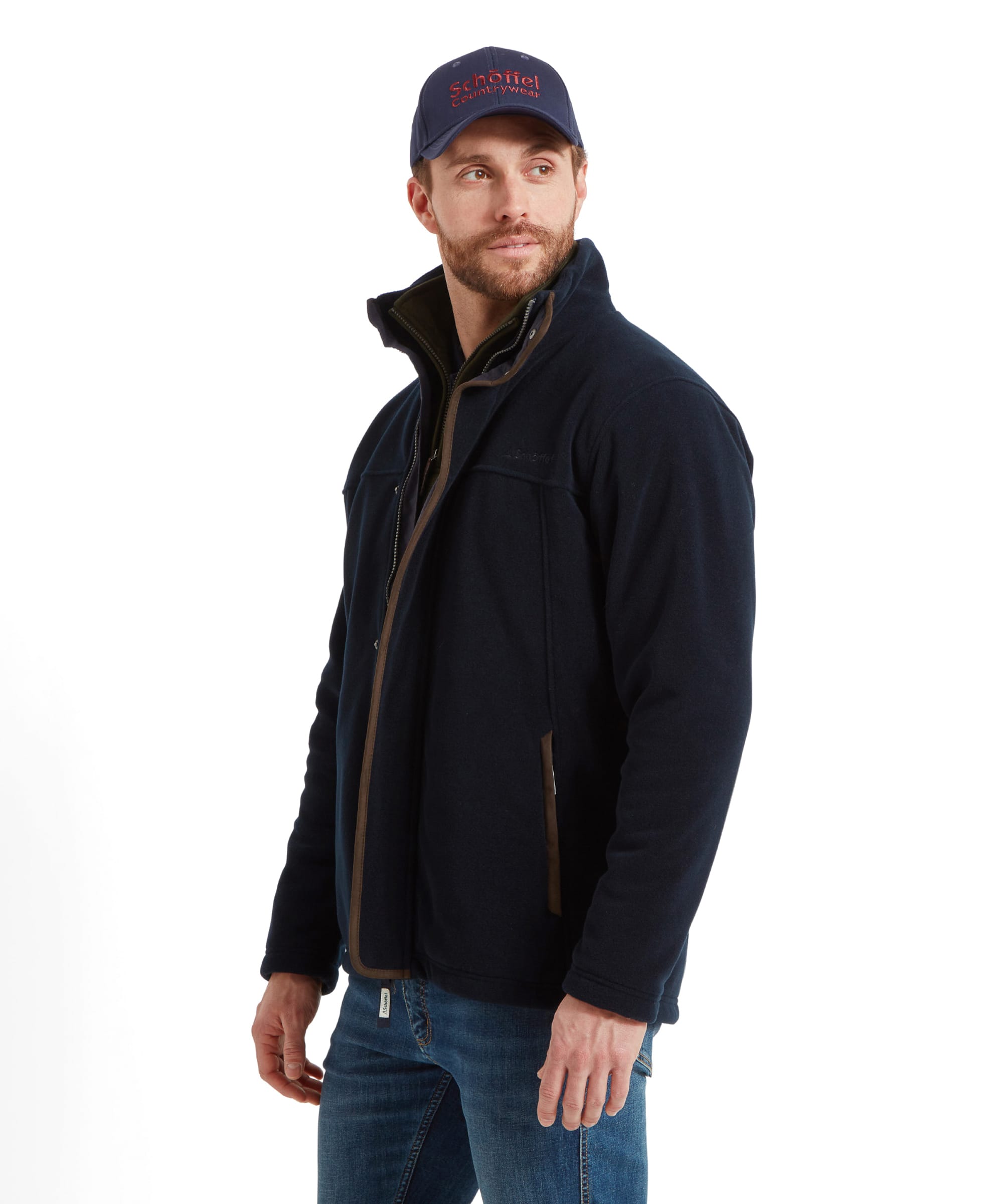 Another side profile of a man modelling the Schöffel Rutland Fleece for Men in Navy highlighting the suede trim designing.