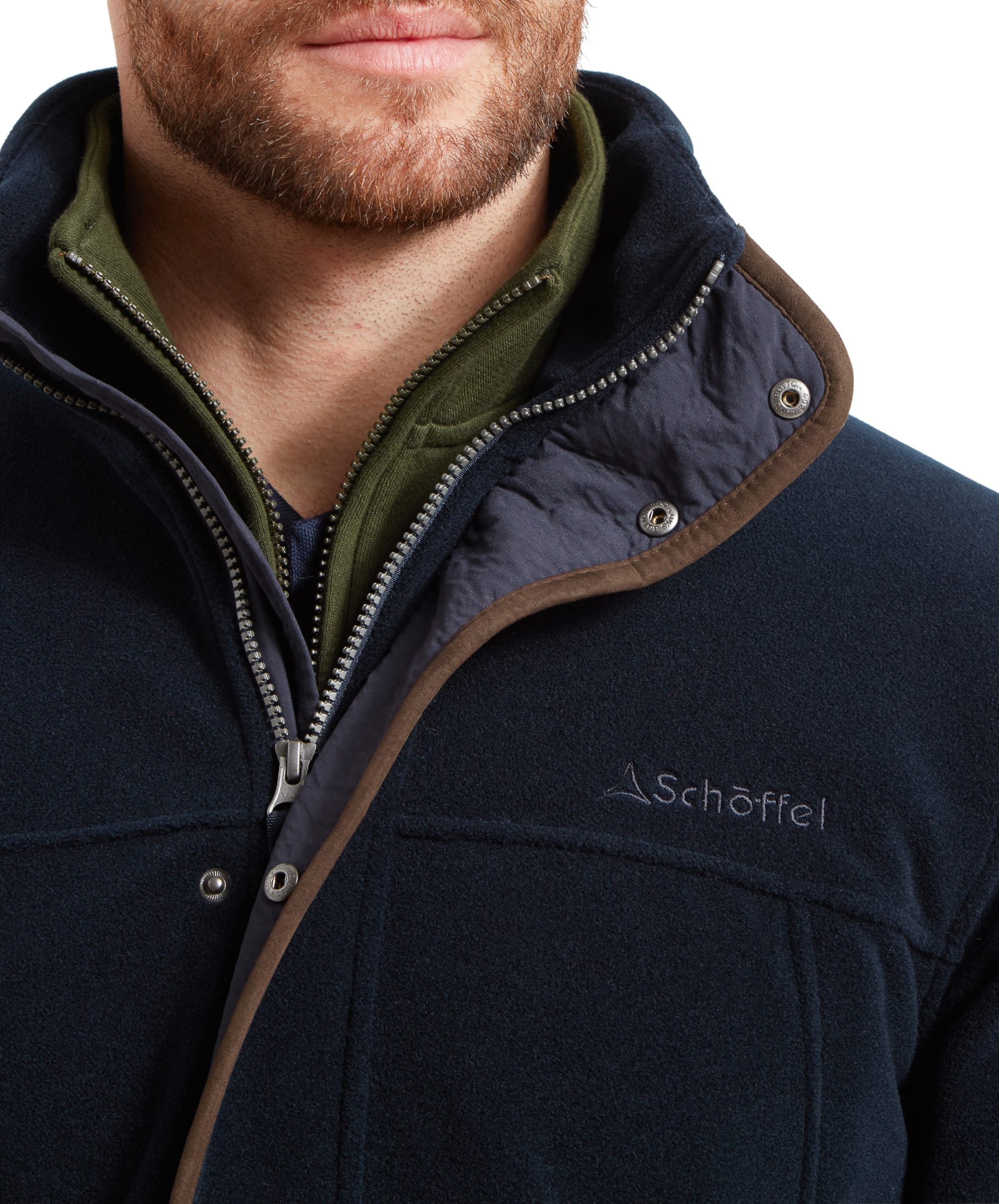 Close-up of the collar and zip area on the Schöffel Rutland Fleece for Men in Navy, highlighting the Schöffel embroidery on the chest and press buttons on the front placket.