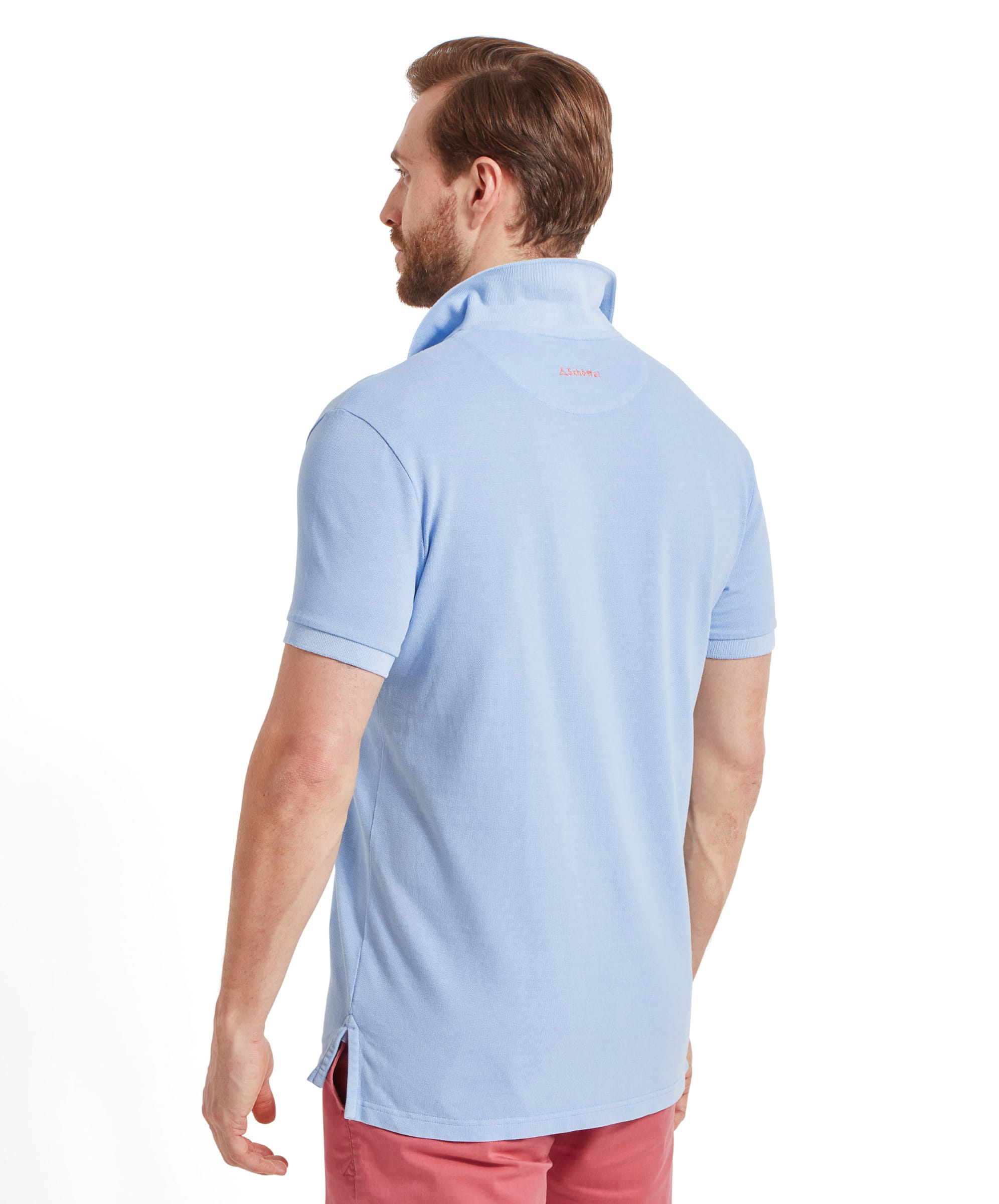 Back view of the Schöffel St Ives Garment Dyed Polo Shirt for Men in Light Blue highlighting the branded embroidery on the back of the neck.