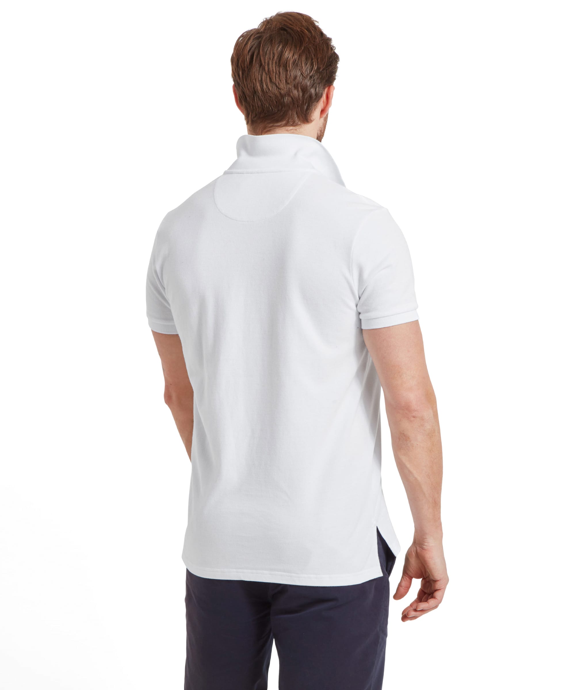 Back view of the man wearing the Schöffel St Ives Polo Shirt for Men in White, displaying the shirt's length and fit.