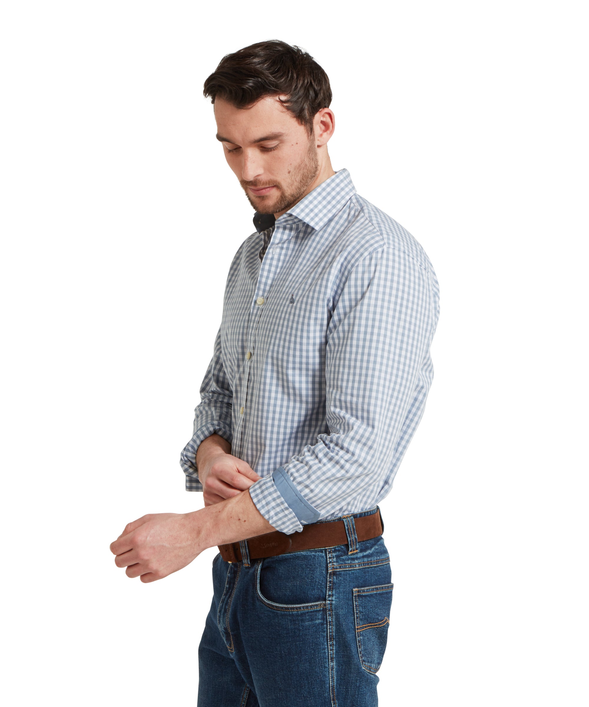 A side profile of a man in the Schöffel Thorpeness Tailored Shirt for Men in Blue, showing the shirt's classic fit and detailing.