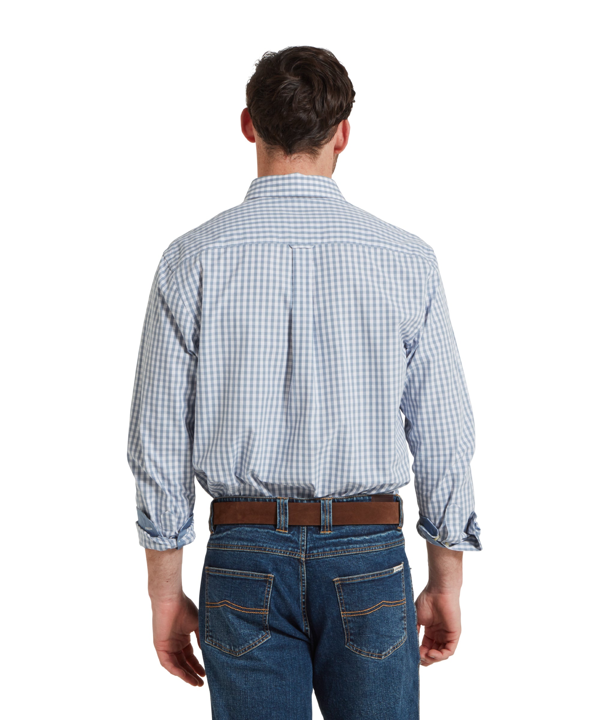 The man is seen from the back, showing the fit of the Schöffel Thorpeness Tailored Shirt for Men in Blue. The shirt features a double pleat for added comfort and ease of movement.