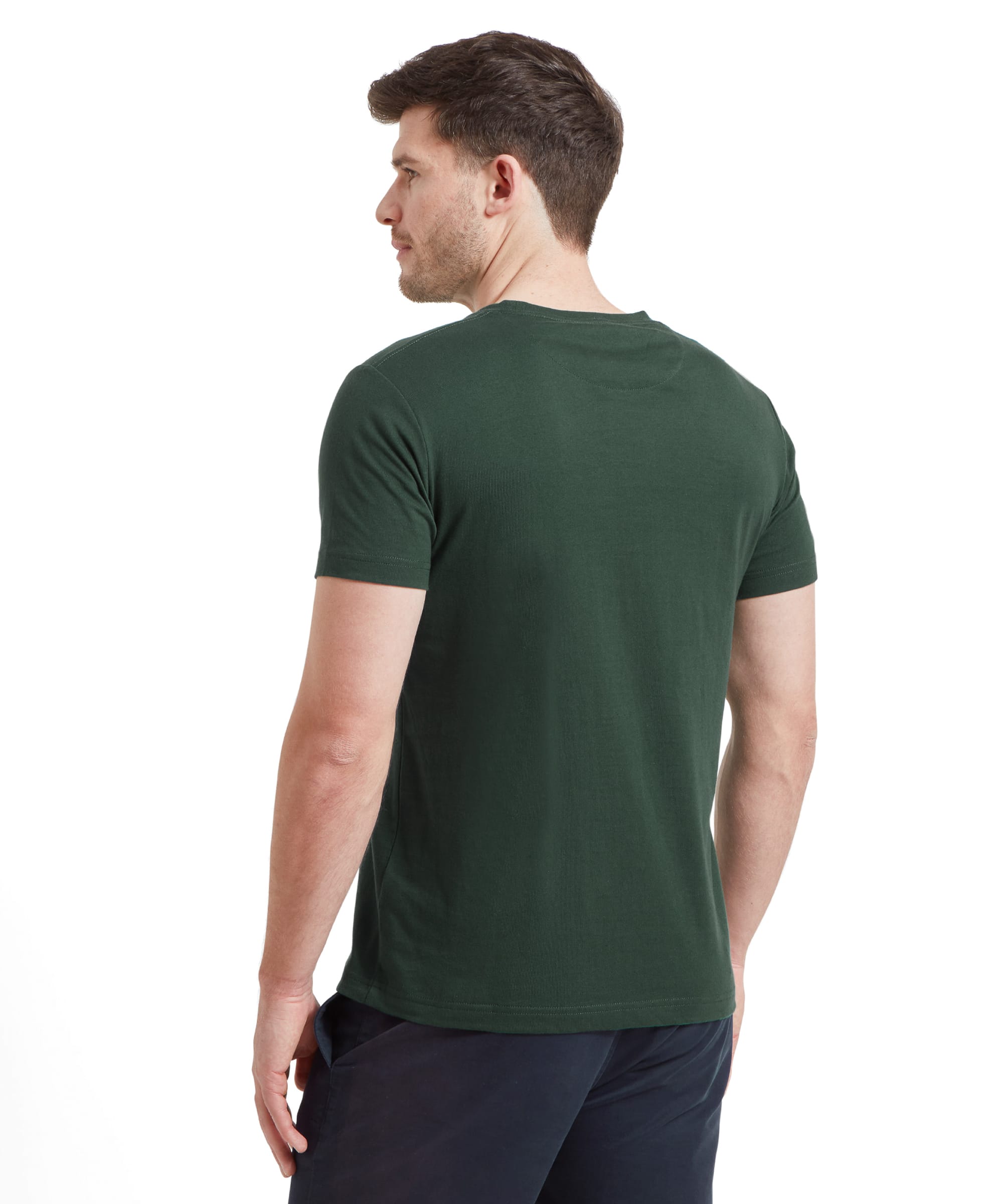 A rear view of a man wearing a Schöffel Trevone T-Shirt for Men in Green, showing the simple, clean design without any graphics or text on the back.