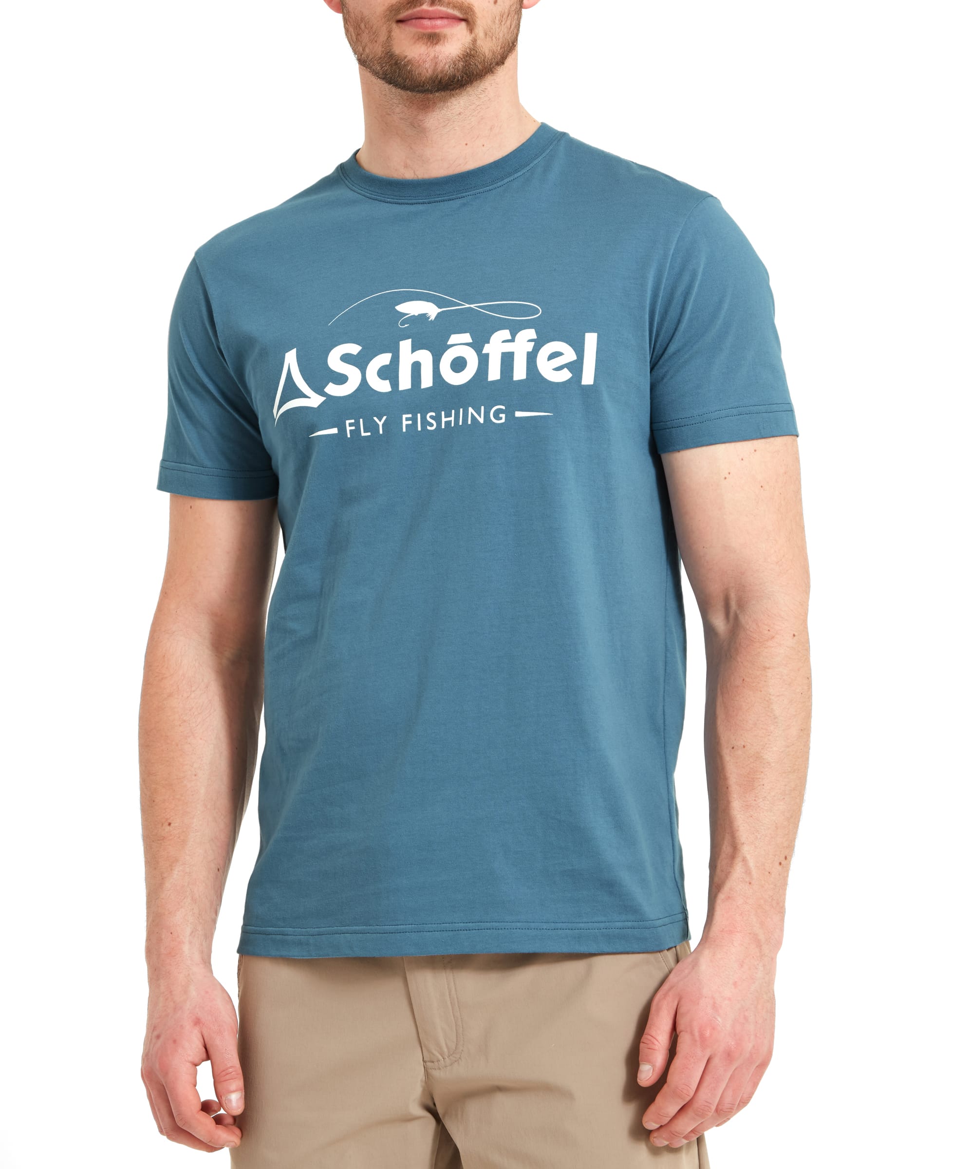 A close-up of the Schöffel Tyne T-Shirt for Men in Blue's front, highlighting the "Schöffel Fly Fishing" text and logo. The T-shirt fits snugly on the man's upper body.