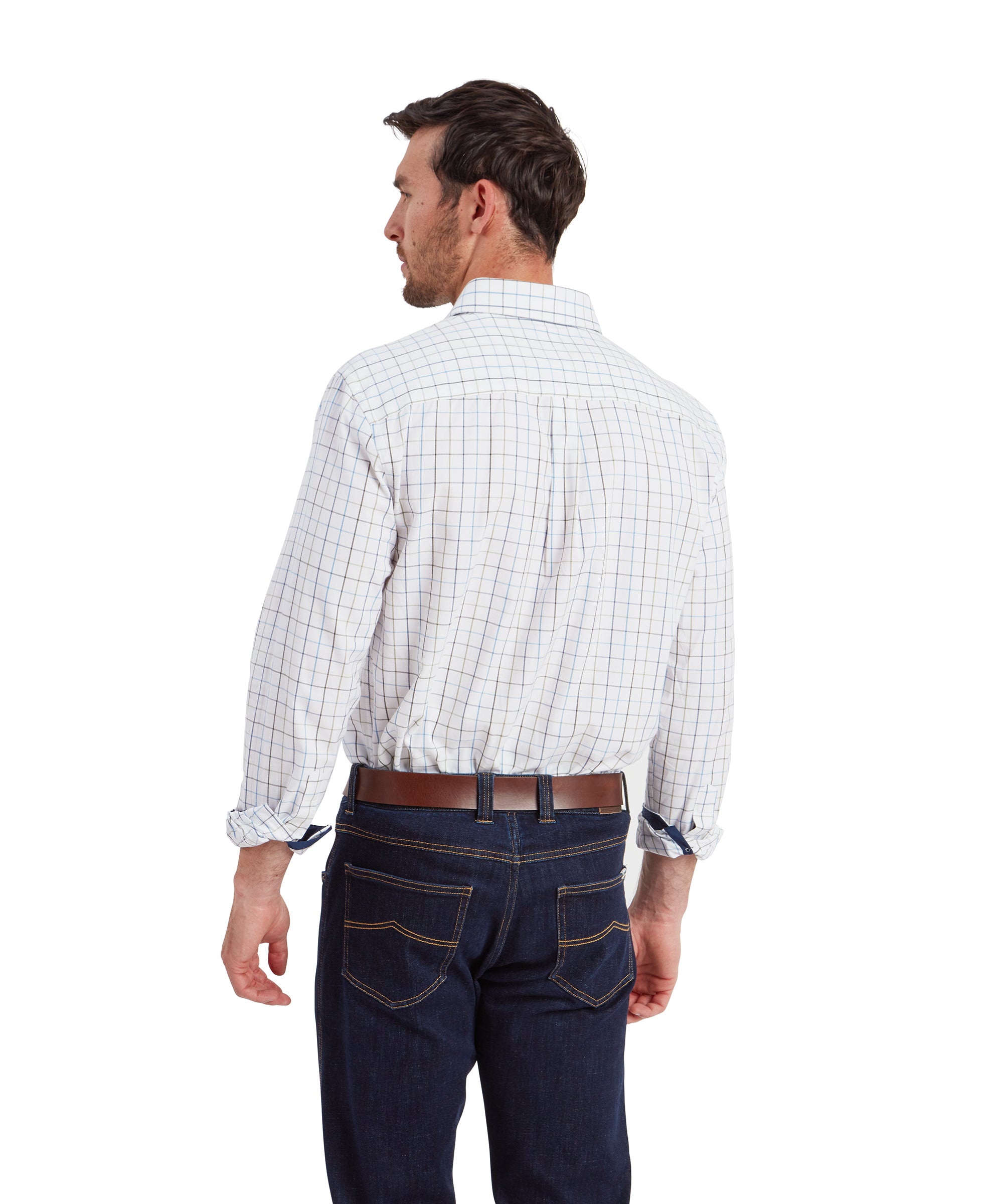 The man is seen from the back, showcasing the Schöffel Wells Tailored Shirt for Men in Blue's fit across the shoulders and down the back. The checkered pattern continues consistently across the shirt. His dark blue jeans have visible stitching on the back pockets, and his brown leather belt is clearly visible.