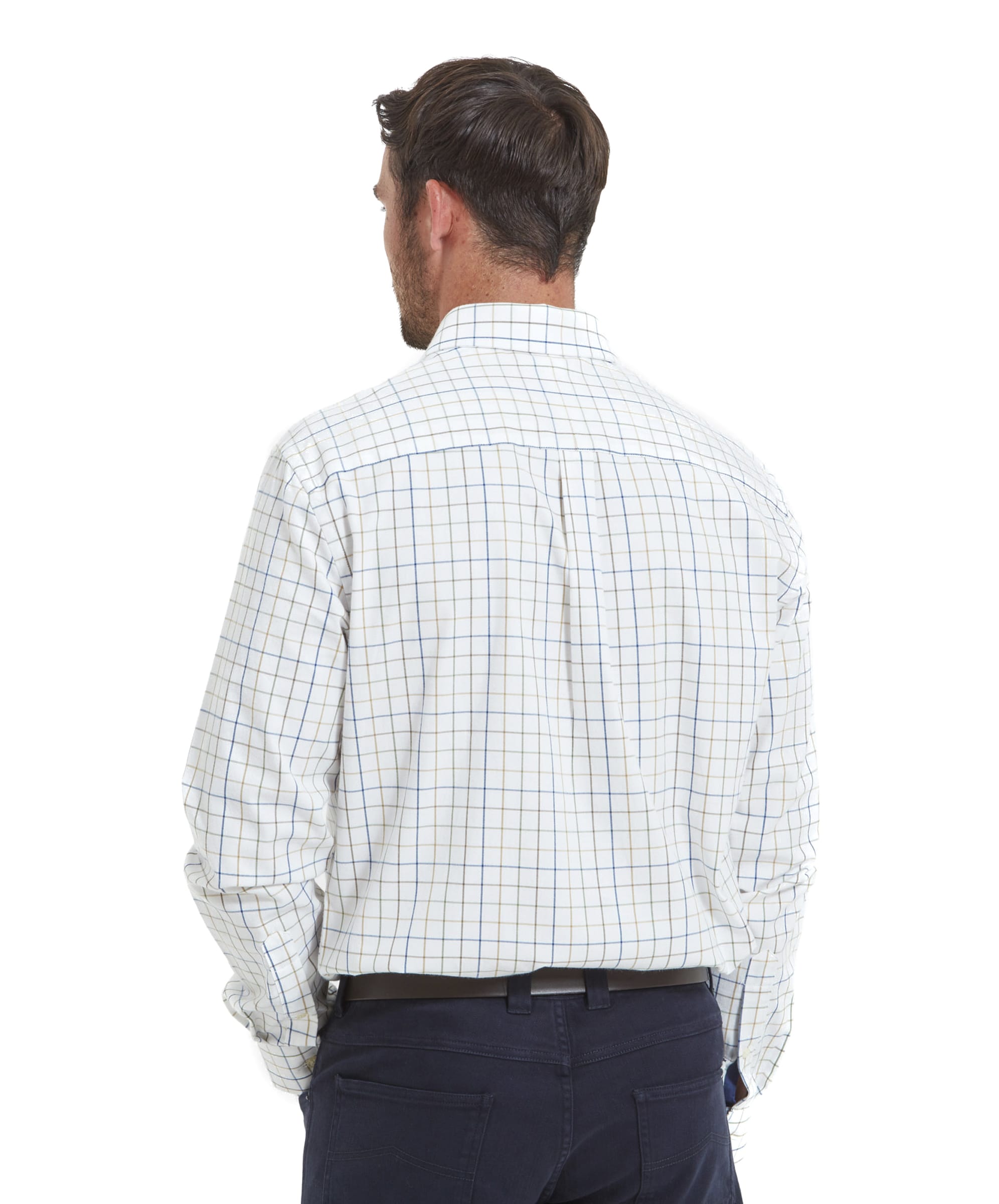 The back view of the same man, showcasing the back design of the Schöffel Wells Tailored Shirt for Men in Green with the check pattern. The shirt has a box pleat at the center back, providing additional comfort and range of motion. The shirt is neatly tucked into navy trousers, highlighting a clean, tailored fit.