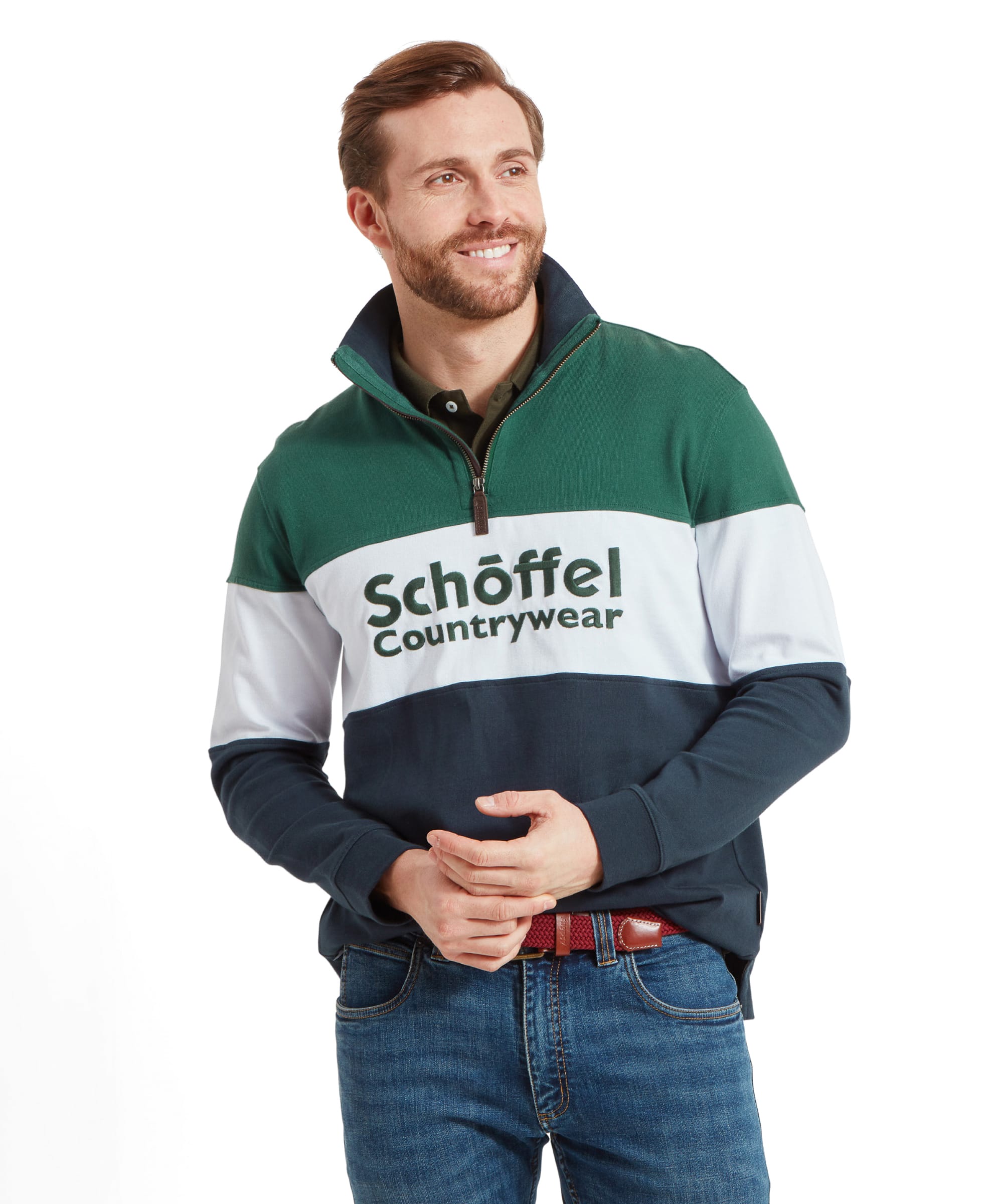 A man wearing a Schöffel Exeter Heritage 1/4 Zip for Unisex in Navy, smiling and looking to the side.