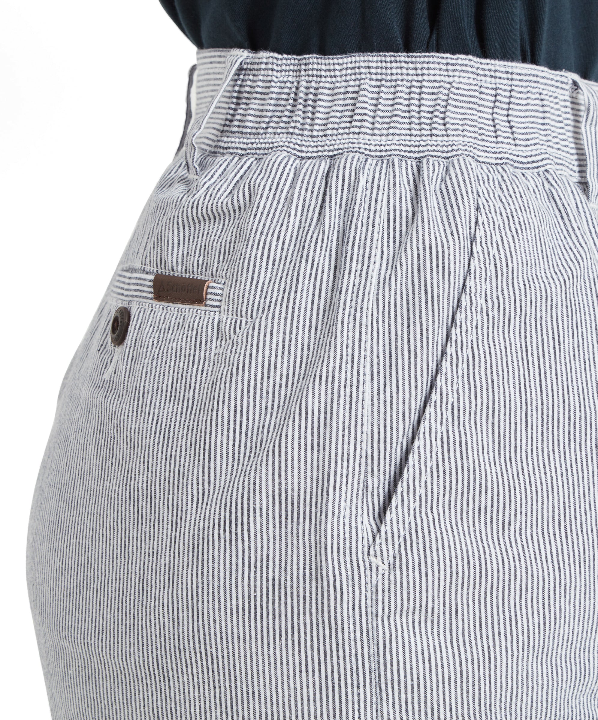 Close-up of Schöffel Aster Shorts for Women in Navy with an elastic waistband, back pocket, and brown tag.