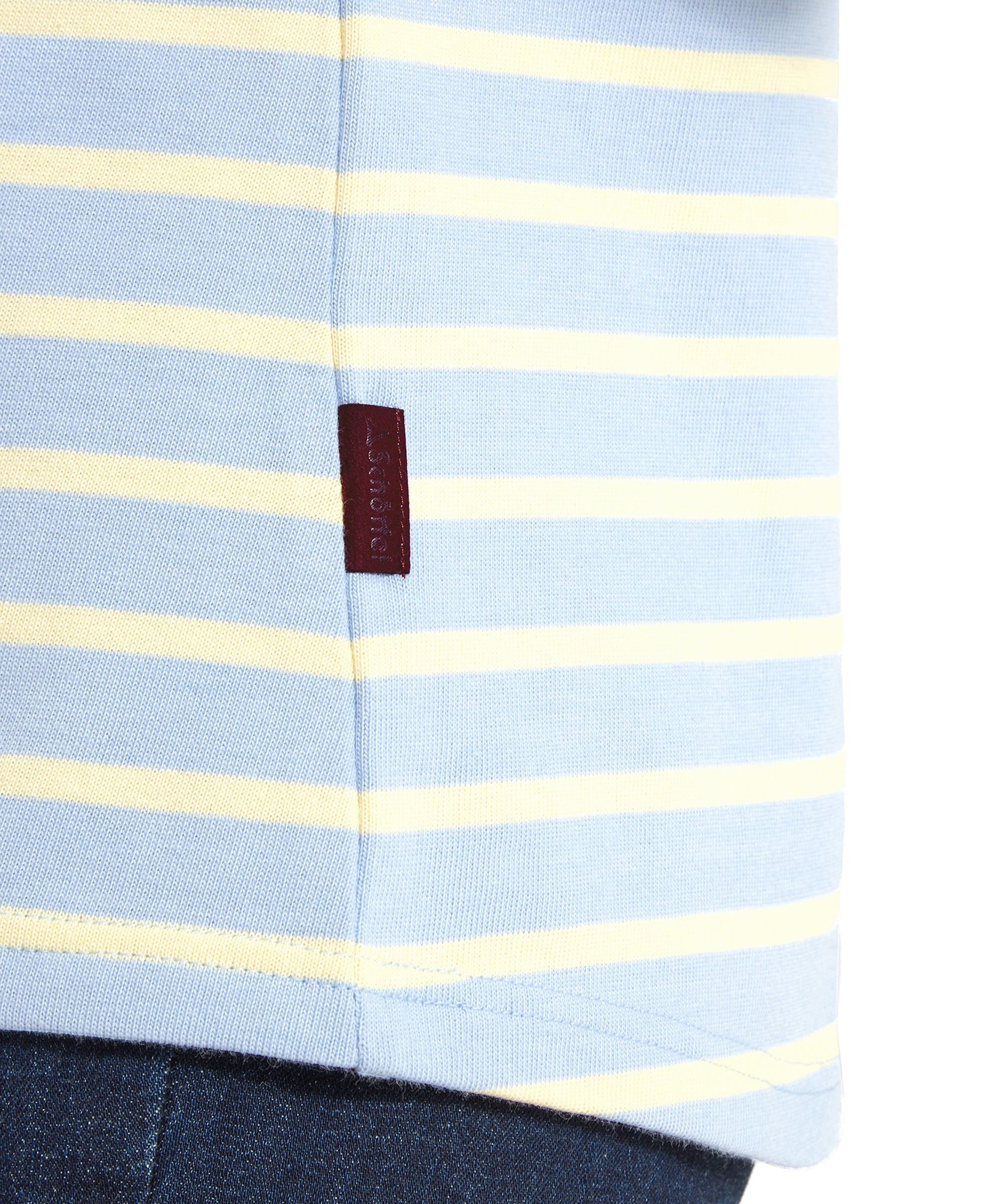 Close-up of the hem and side seam tag on a Schöffel Beauport Top for Women in Yellow.