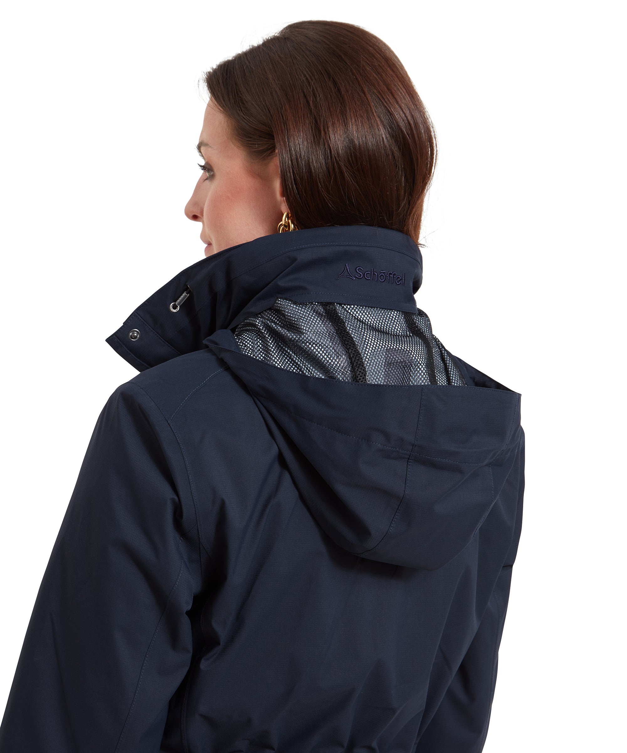 A close-up of the back of the collar on a Schöffel Edith Jacket for Women in Blue, featuring the hood partially tucked in with mesh lining visible.