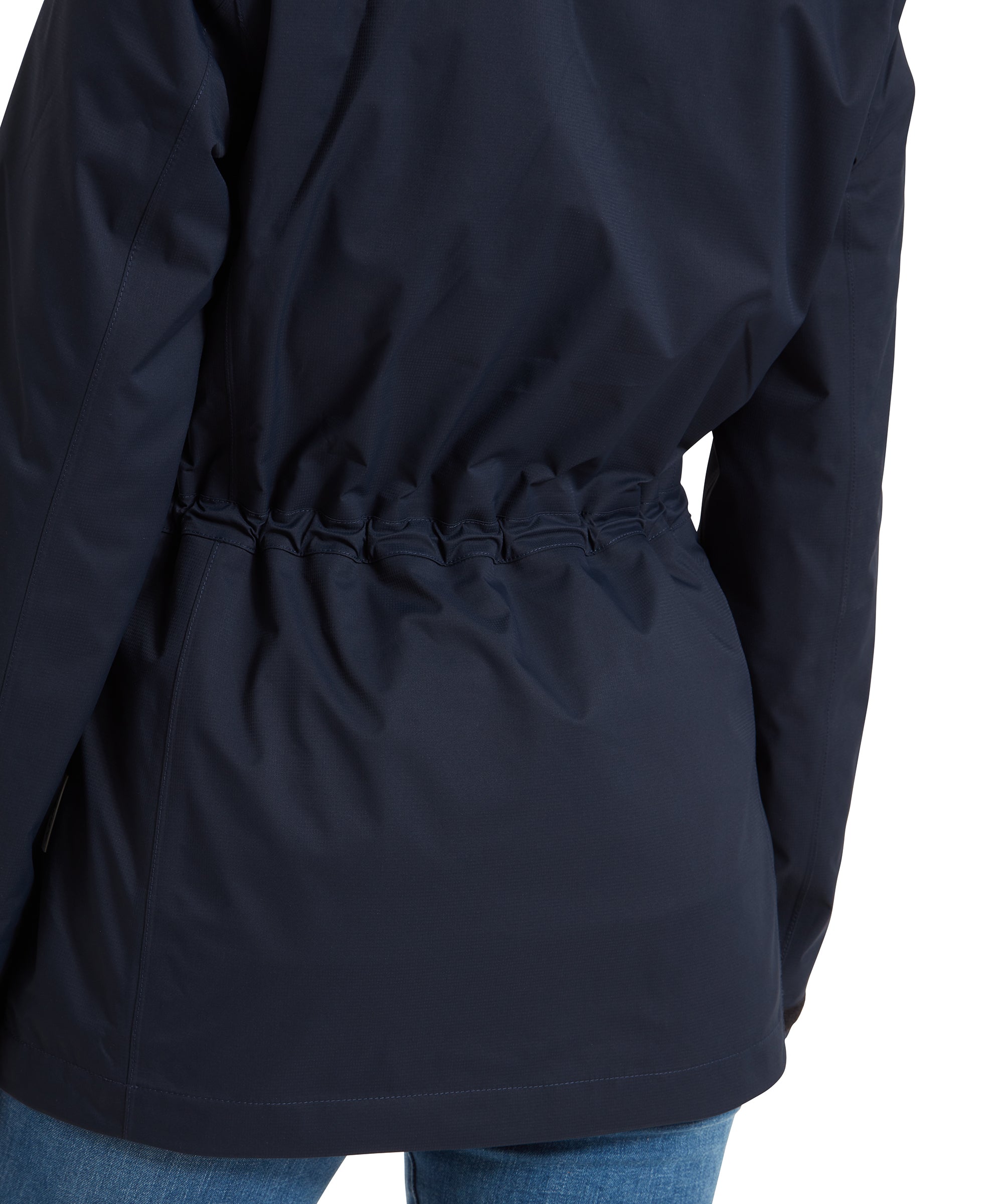 A close-up of the waist area of a Schöffel Edith Jacket for Women in Blue, showing the cinched waist detail that provides a tailored fit.