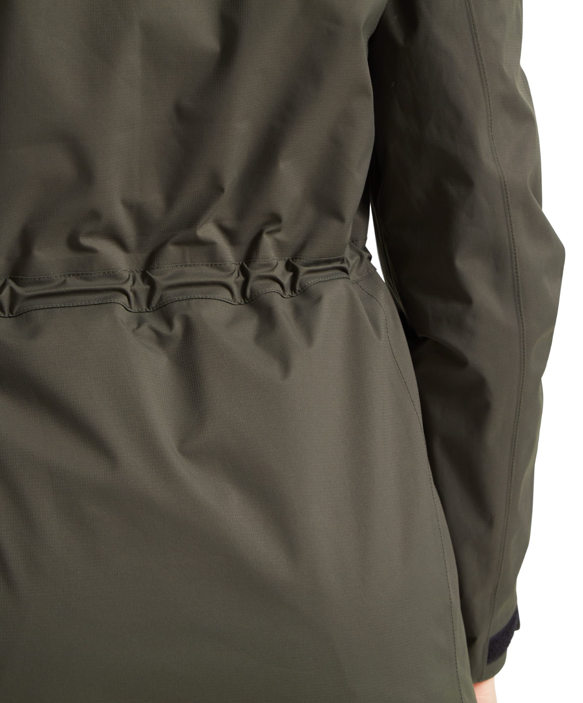 Back view of the Schöffel Edith Jacket for Women in Green, focusing on the waist cinch feature for a tailored fit.