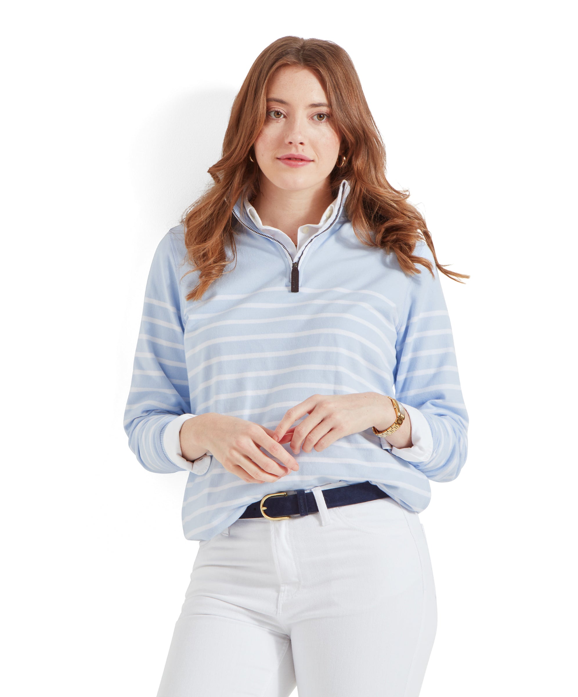 A woman wearing a Schöffel Hope Cove Sweatshirt for Women in Blue, standing with hands slightly clasped, looking at the camera, with a white background.