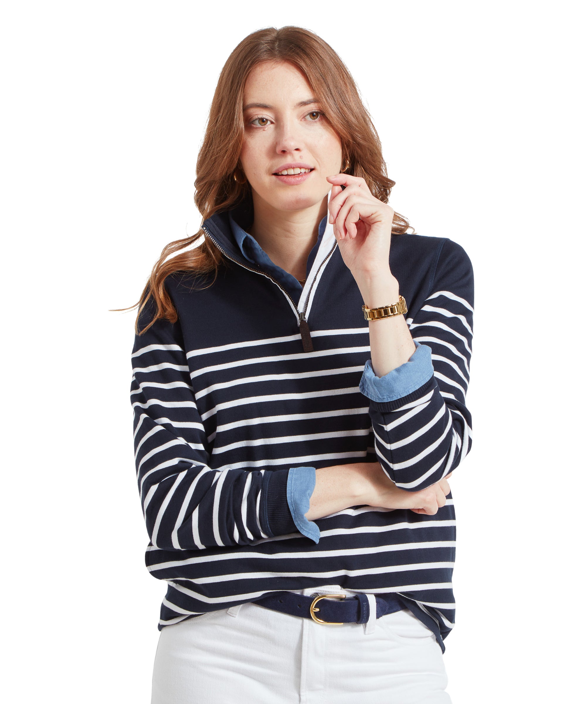 A woman wearing a Schöffel Hope Cove Sweatshirt for Women in Navy, casually touching her face and looking forward.