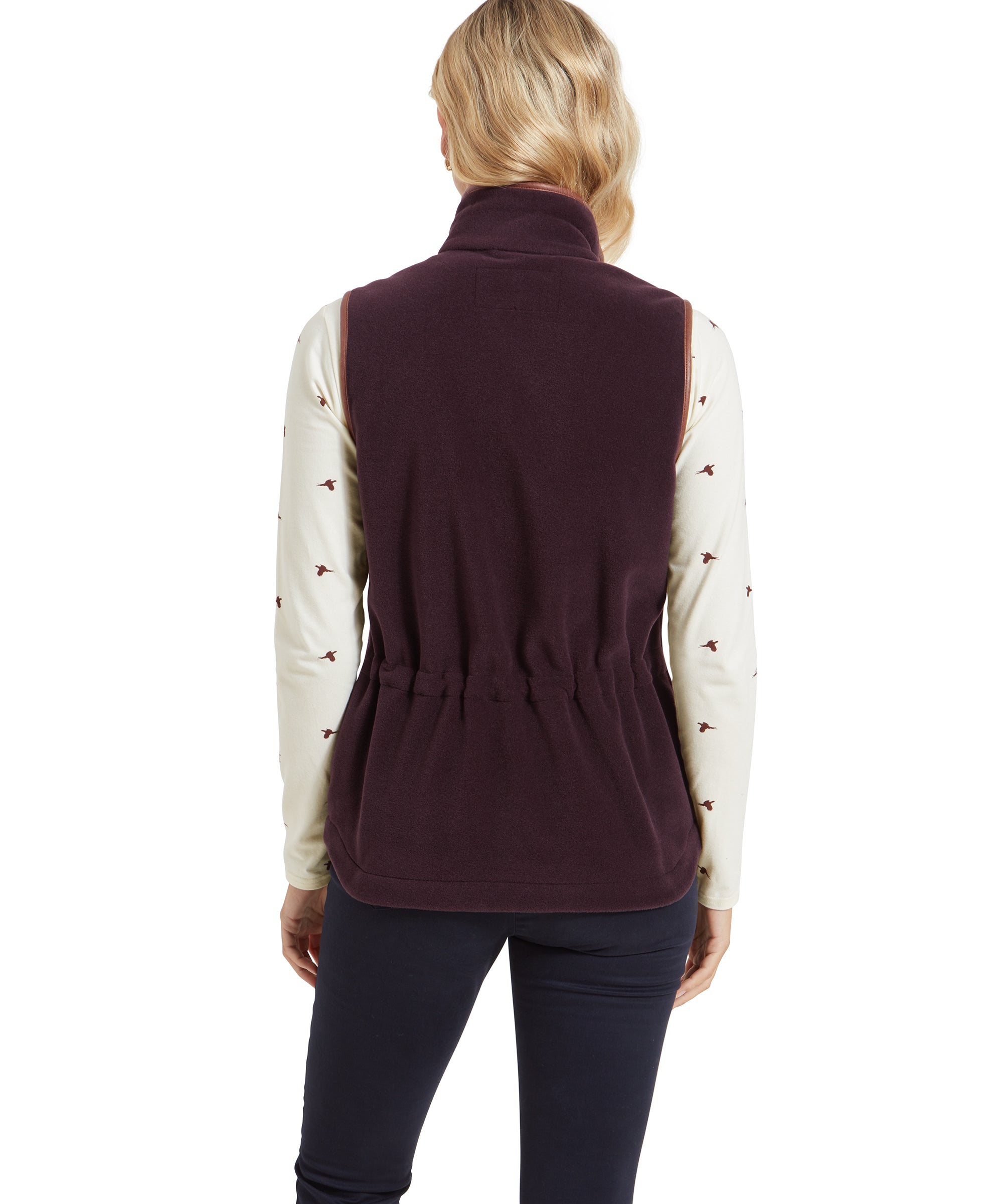 A rear view of the Schöffel Lyndon Fleece Gilet for Women in Brown showcasing the adjustable waist that provides a tailored fit. The gilet’s slightly flared lower hem adds a stylish touch to the design.