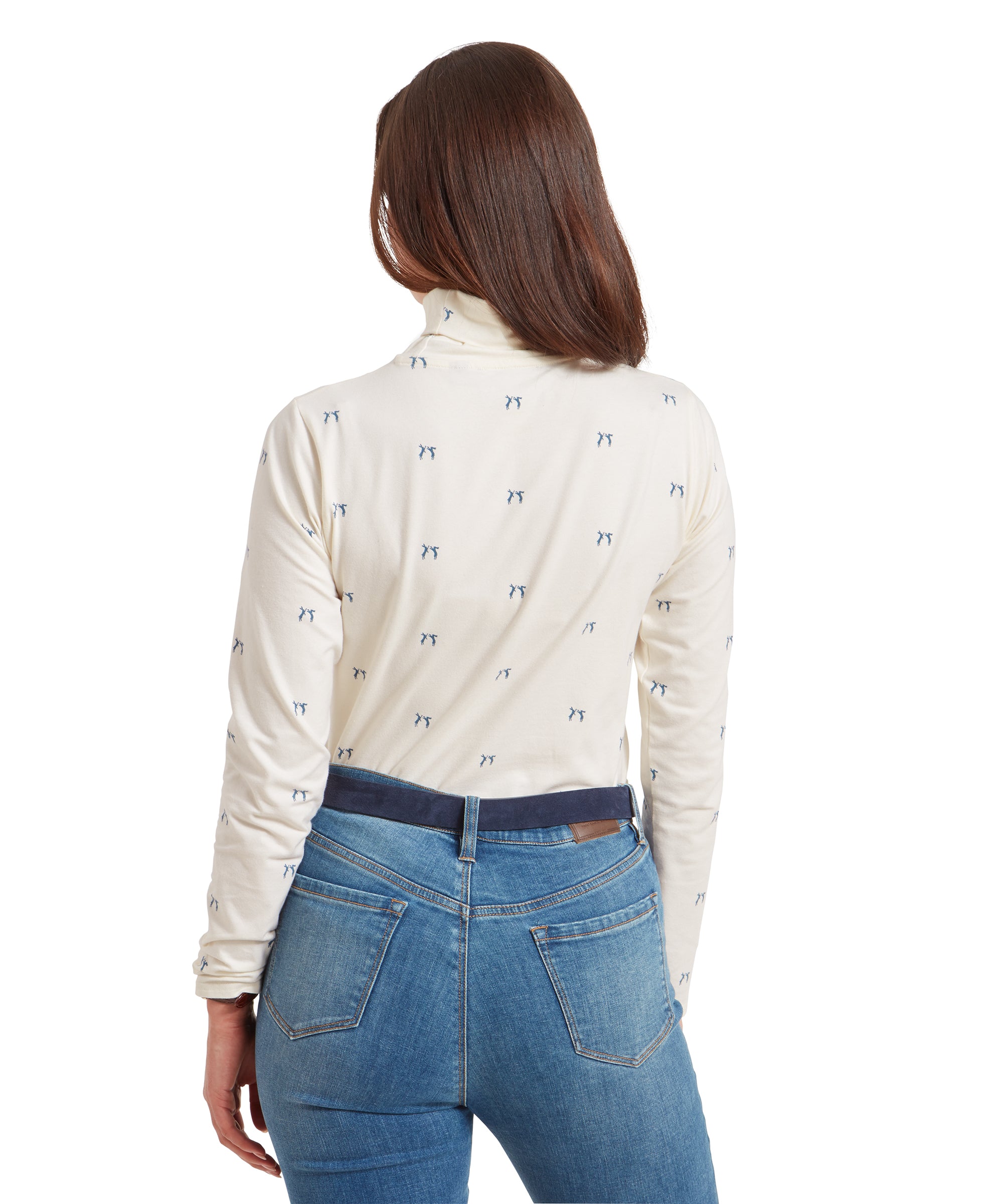 A back view of the woman wearing the Schöffel Malham Top for Women in Blue with a small blue pattern, paired with light blue jeans, showing the full design of the top.