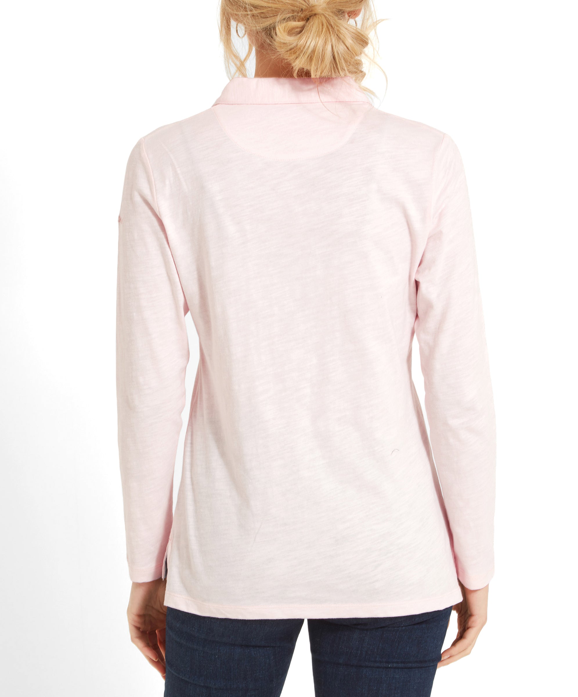 Back view of the woman showing the collar on the Schöffel Pentle Bay Top for Women in Pink and the straight hemline at the back.