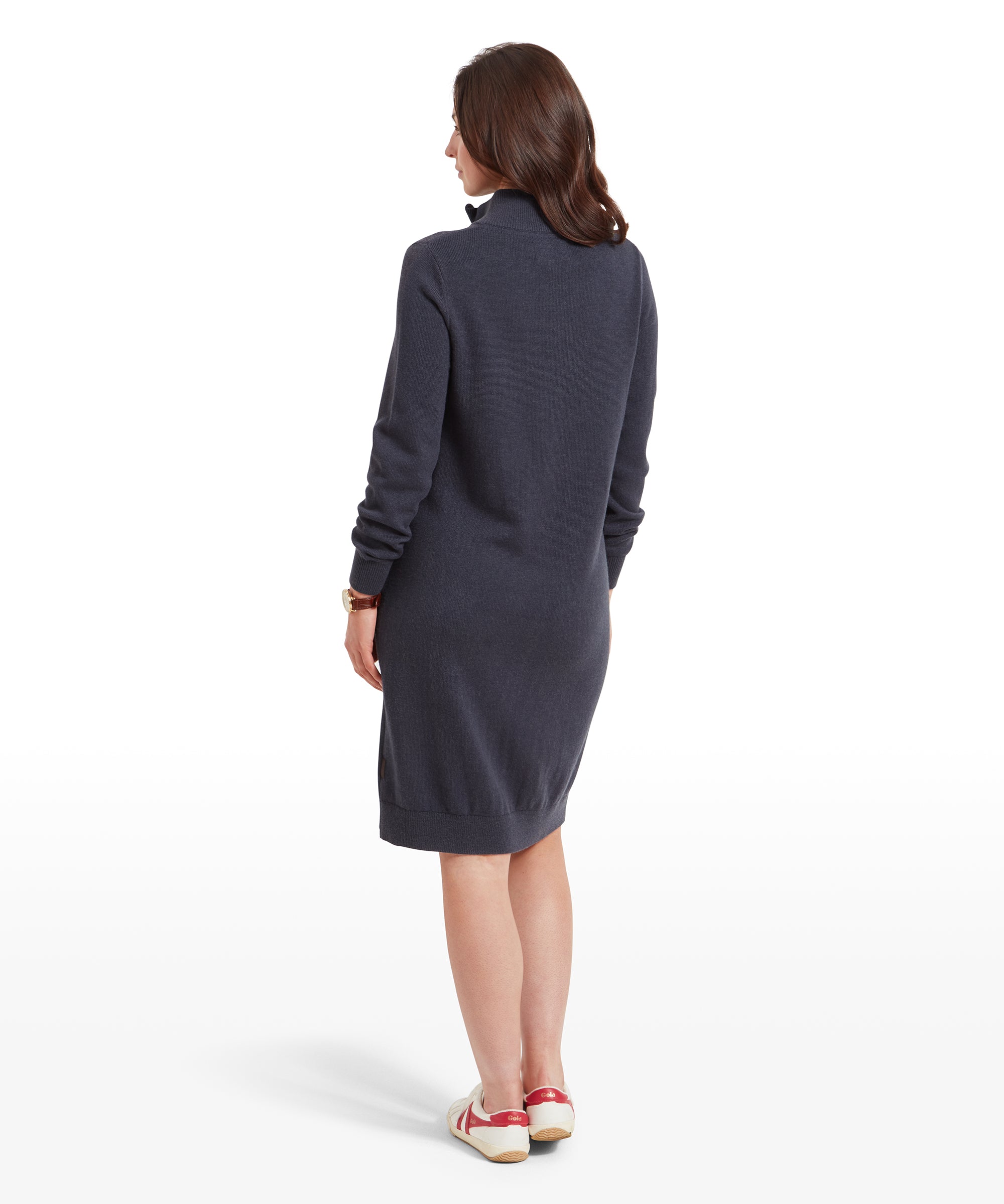 Rear view of the woman in the Schöffel Primrose Dress for Women in Navy, highlighting the back design and length of the dress, which falls just above the knee.