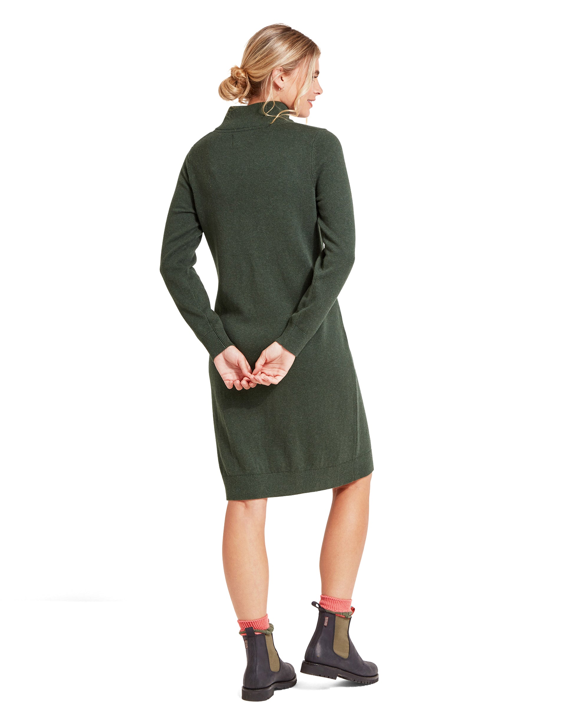 The back view of the model showcases the Schöffel Primrose Dress for Women in Green's simple design and comfortable fit.