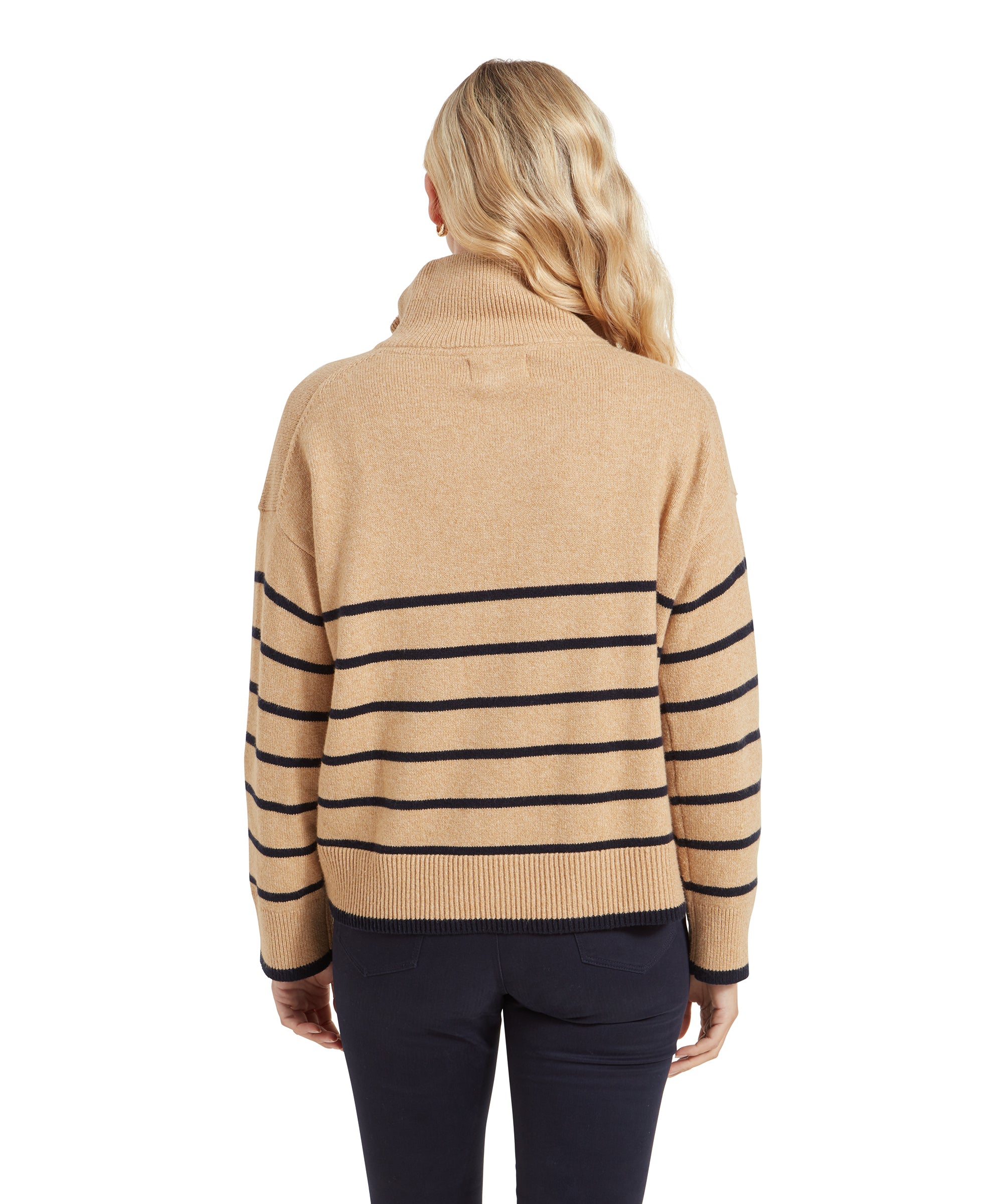 Back view of the woman in the Schöffel Sandsend 1/4 Jumper for Women in Beige, highlighting the stripes across the back and the comfortable, loose fit.