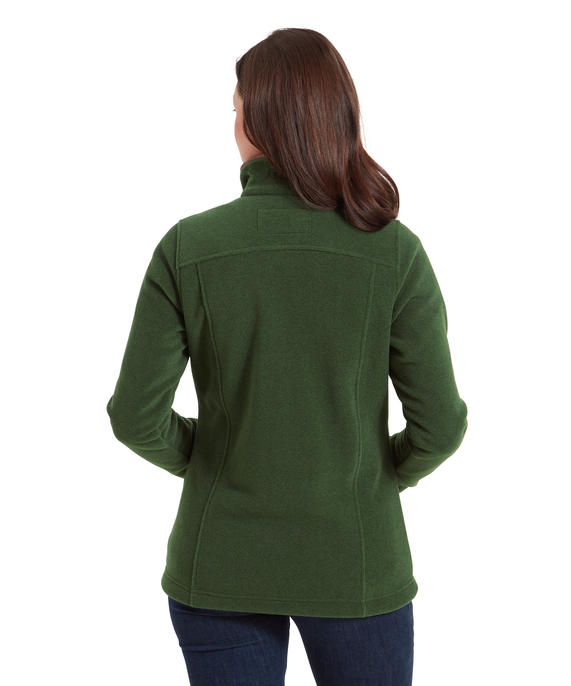 The woman is shown from behind, highlighting the simple and clean design of the Schöffel Tilton 1/4 Zip Fleece for Women in Light Green. The back has subtle seam details and a fitted shape. Her hair is straight and drapes down her back, emphasising the high collar of the fleece.