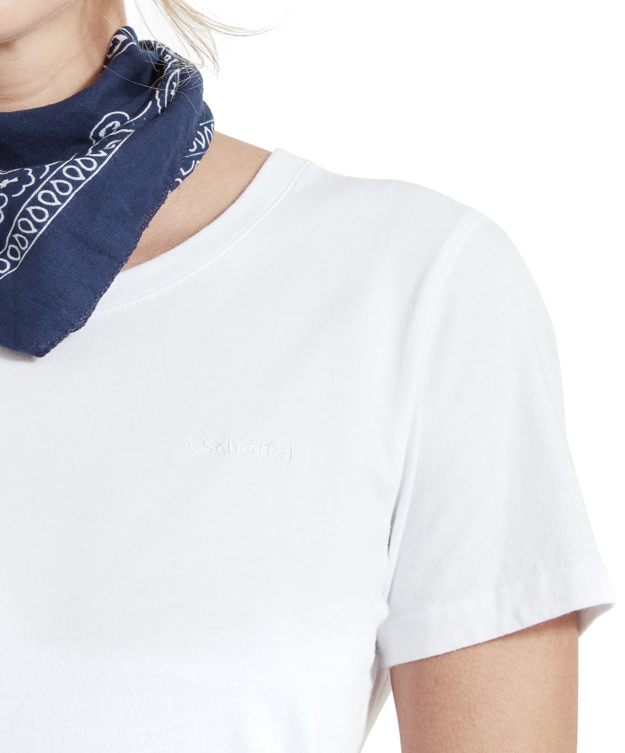 Close-up of the Schöffel Tresco T Shirt for Women in White, focusing on the logo on the chest and the blue bandana.