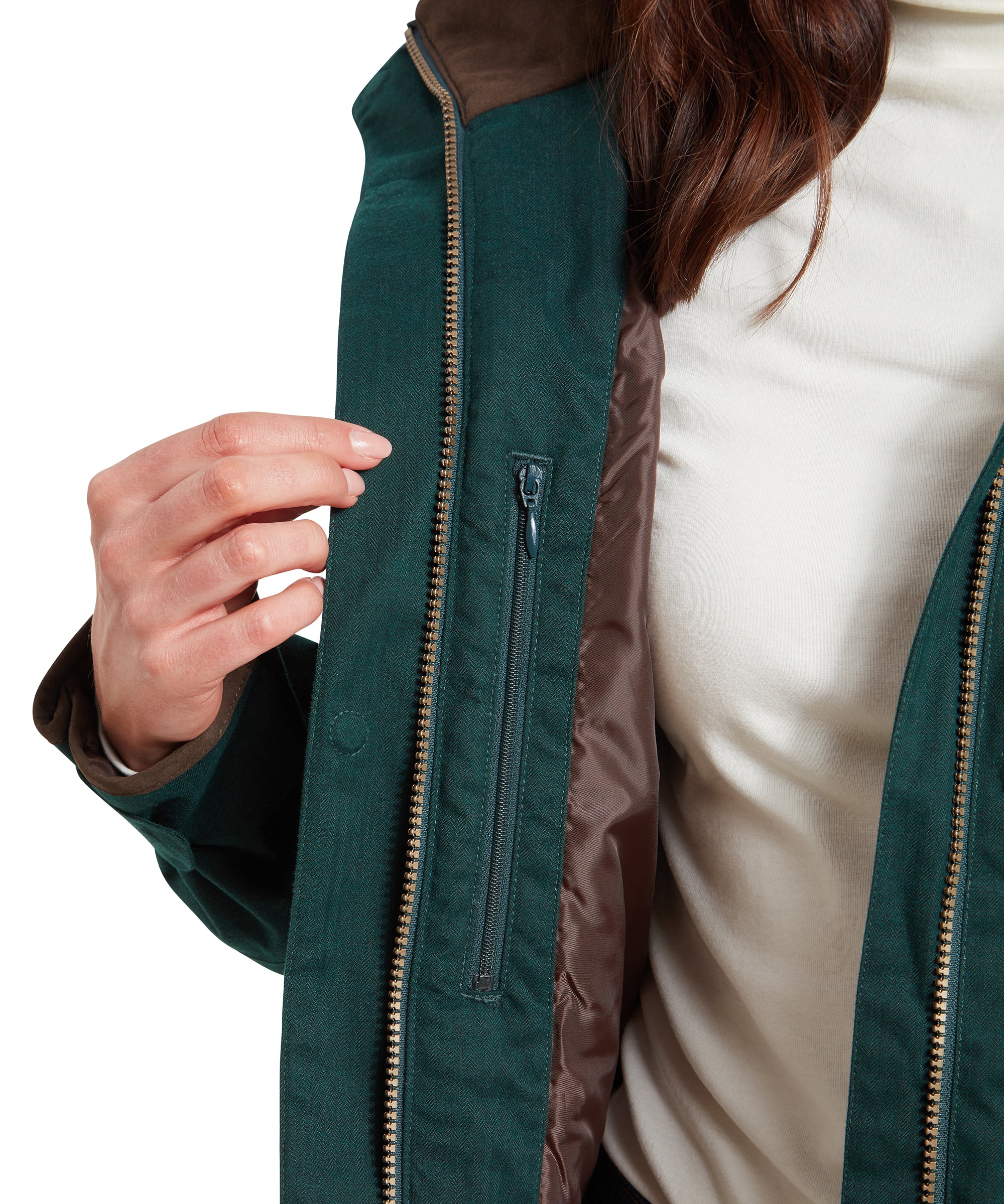 A close-up on the internal security pocket on the Schöffel Wakerley Jacket for Women in Green.